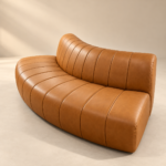 Curved Caramel Leather Channel Sofa
